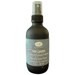 Room spray bottle labeled '999 Ghosts' from Enchanted Escapes Collection on a white background