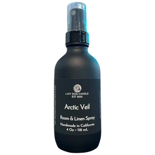 Black room and linen spray bottle labeled 'Arctic Veil' by Lazy Dog Candle on a white background