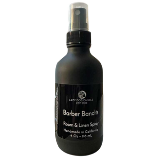Black bottle of 'Barber Bandits' room & linen spray by Lazy Dog Candle on a white background