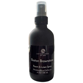 Black room and linen spray bottle labeled 'Boston Brownstone' by Lazy Dog Candle on a white background.