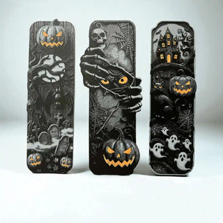 Three Halloween-themed bookmarks  with spooky designs on a white background
