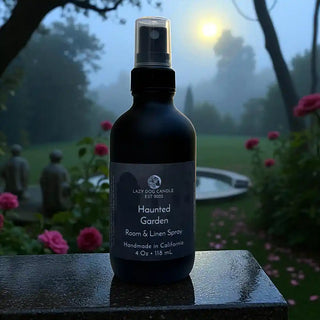 Bottle of 'Haunted Garden' room & linen spray with a garden background
