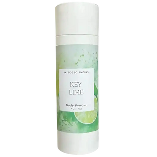 Key Lime body powder container with green and white design on a white background