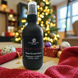 Black room & linen spray bottle with festive background