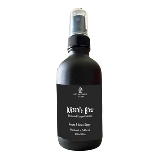 Black room and linen spray bottle labeled 'Wizard's Brew' on a white background